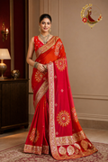 Red and pink ombré silk saree with gota patti sun medallions, worn by a model